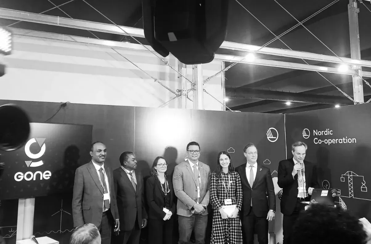 Seven ministers and high-level representatives on stage at COP29 in Baku for the announcement of the Group of Negative Emitters, in front of GONE and Nordic Co-operation banners.